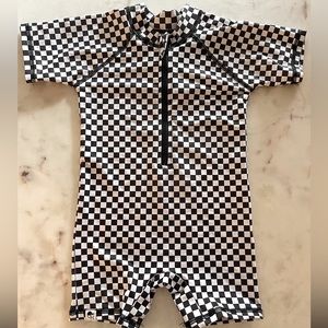 George Hats small shop toddler checker swim sun suit. Never worn size 3-4T